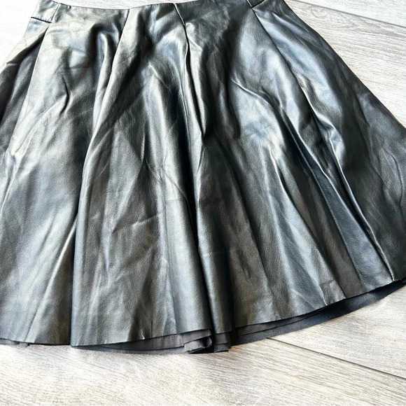 Bebe Black Faux Leather Pleated Mini Circular Skirt - Picture 4 of 10